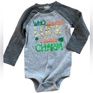 St Patrick’s Koala Kids baby bodysuit with text "WHO needs LUCK I have CHARM”